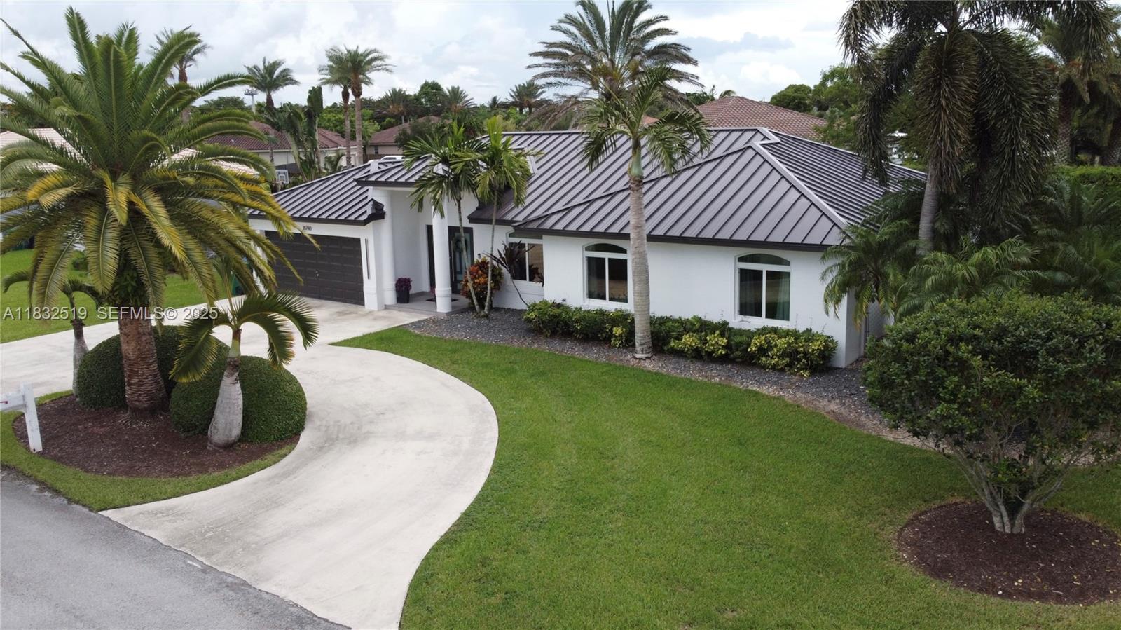 18740 Southwest 297th Street Homestead, FL 33030 - Photo 41 of 46 a view of a house with a yard