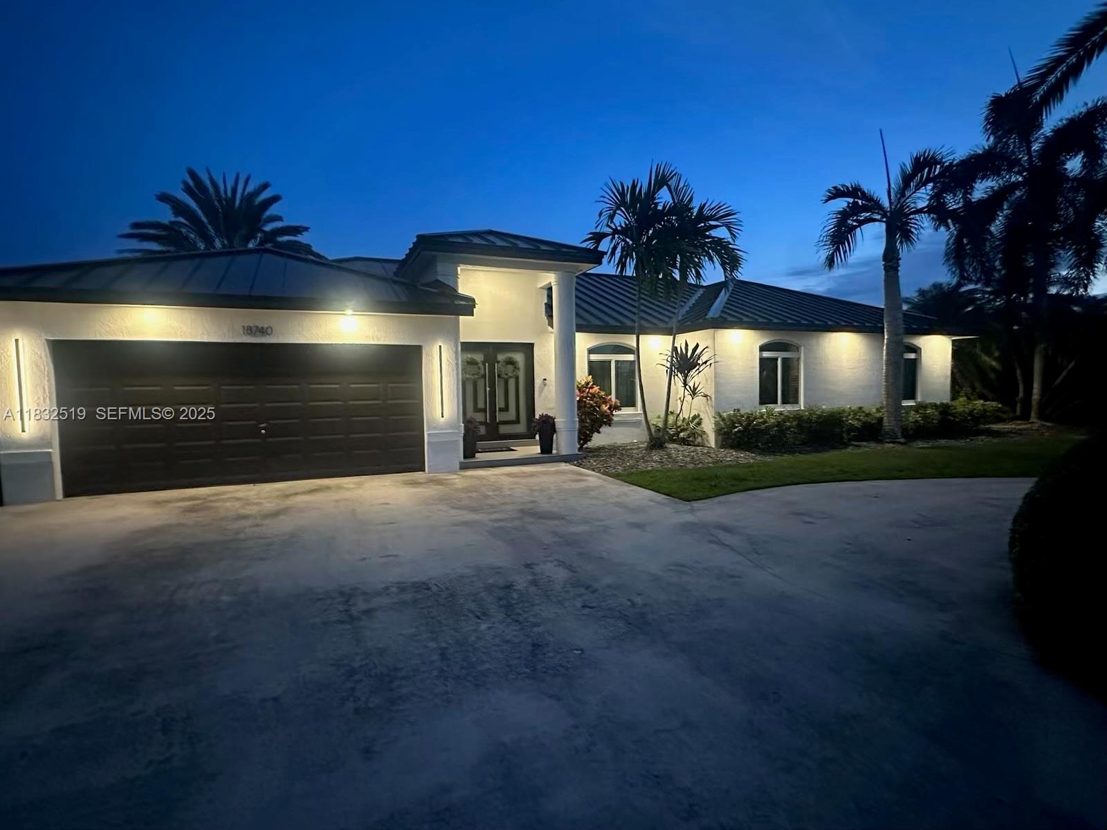18740 Southwest 297th Street Homestead, FL 33030 - Photo 44 of 46 a view of a house with a yard