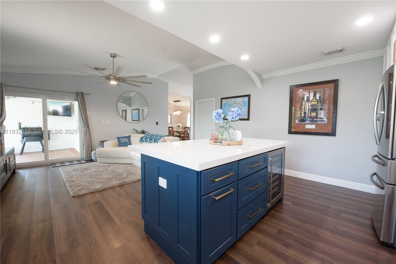 18740 Southwest 297th Street Homestead, FL 33030 - Photo 6 of 46 a view of kitchen with stainless steel appliances granite countertop a sink and a stove top oven