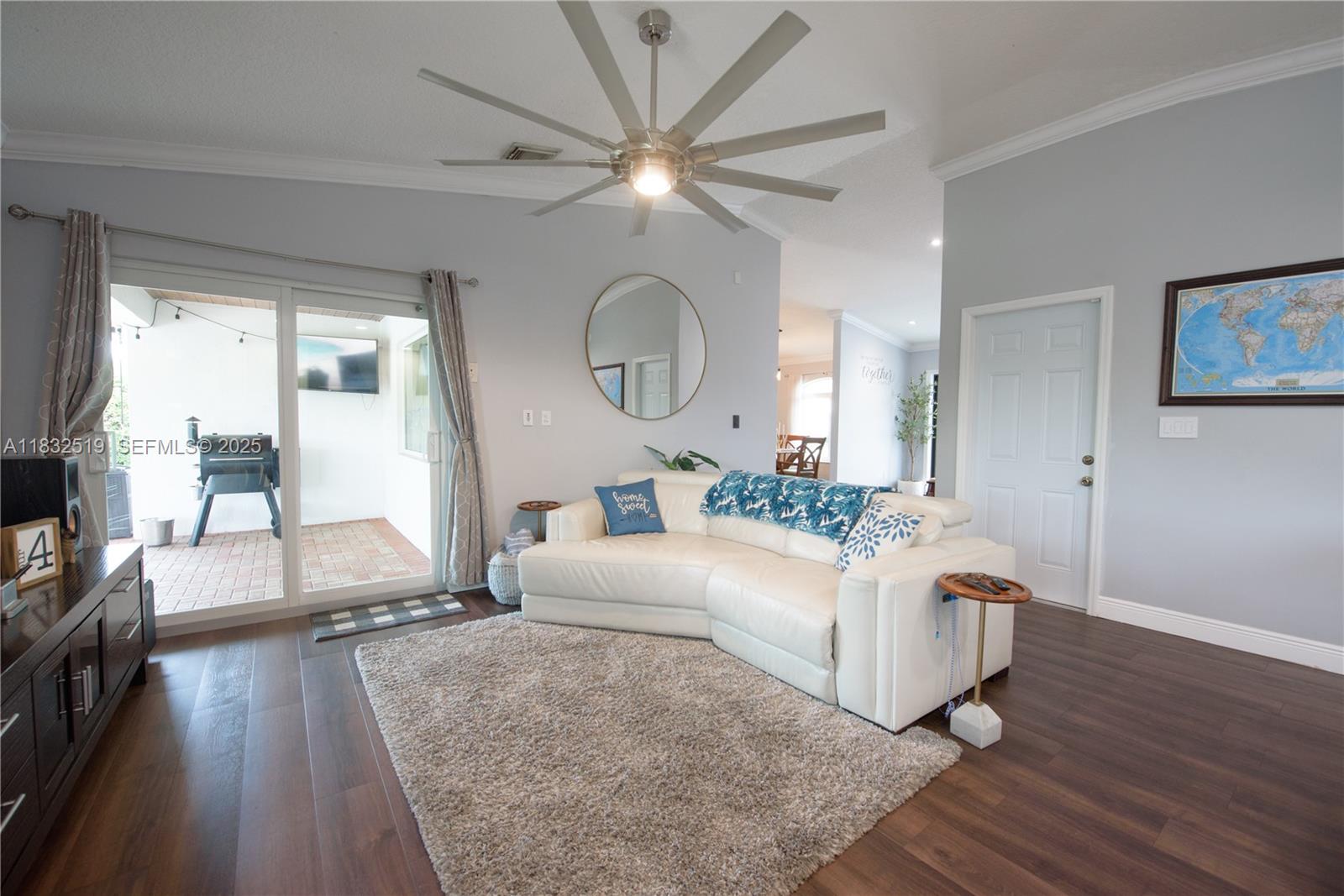 18740 Southwest 297th Street Homestead, FL 33030 - Photo 7 of 46 a living room with furniture and a large window