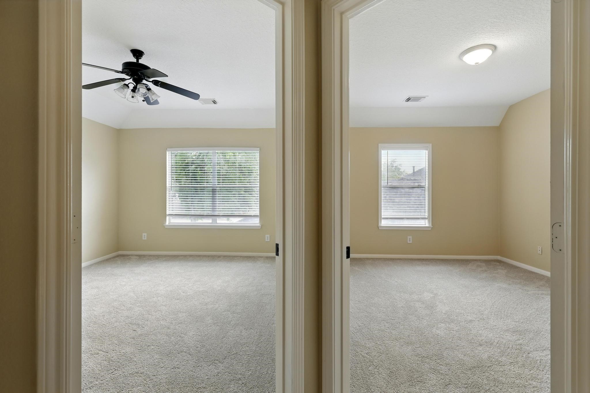 11030 Sprucedale Court Houston, TX 77070 - Photo 32 of 36 a view of a livingroom with a ceiling fan and window