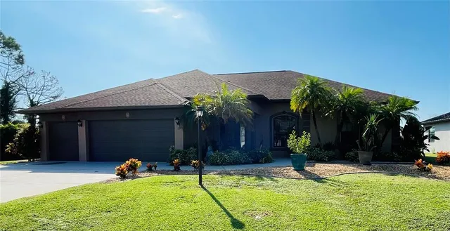 a view of house with yard outdoor seating and entertaining space