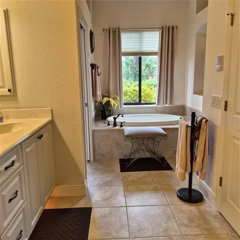 a bathroom with a sink and a bathtub