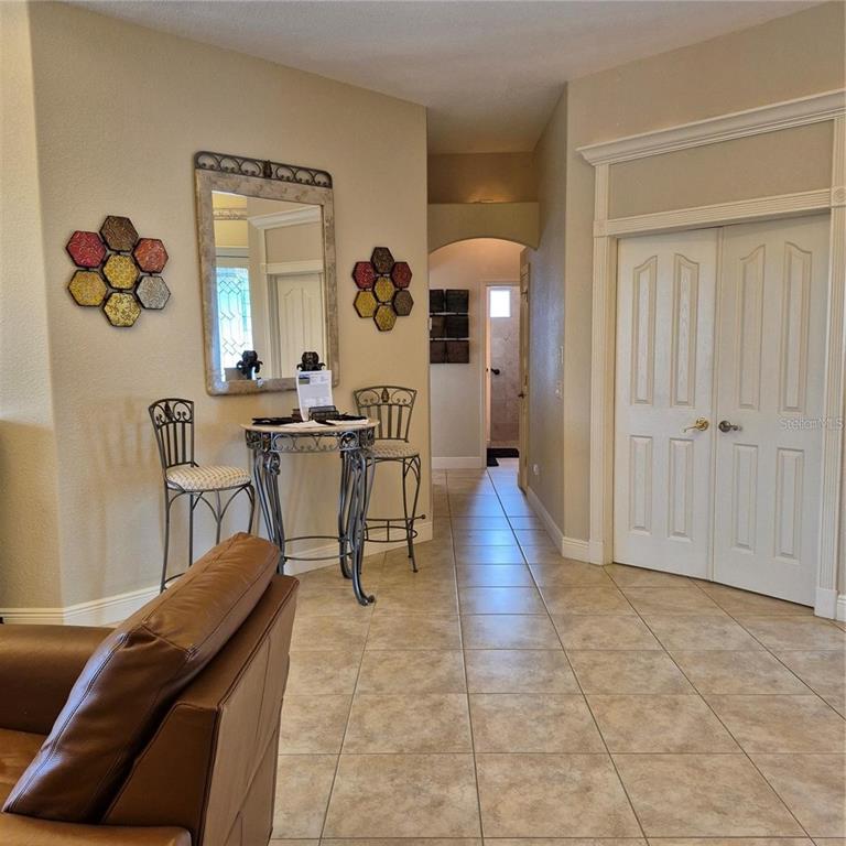 19 Medalist Way Rotonda West, FL 33947 - Photo 4 of 30 a living room with furniture