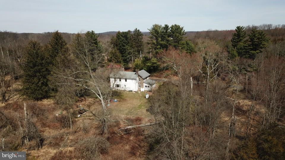 432 Quarry Road Ottsville, PA 18942 - Photo 29 of 29 a view of a city with lush green forest