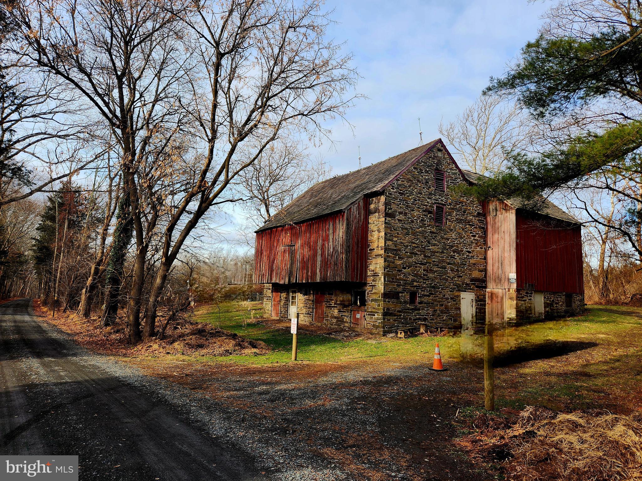 432 Quarry Road Ottsville, PA 18942 - Photo 5 of 29 a view of a house with backyard and tree