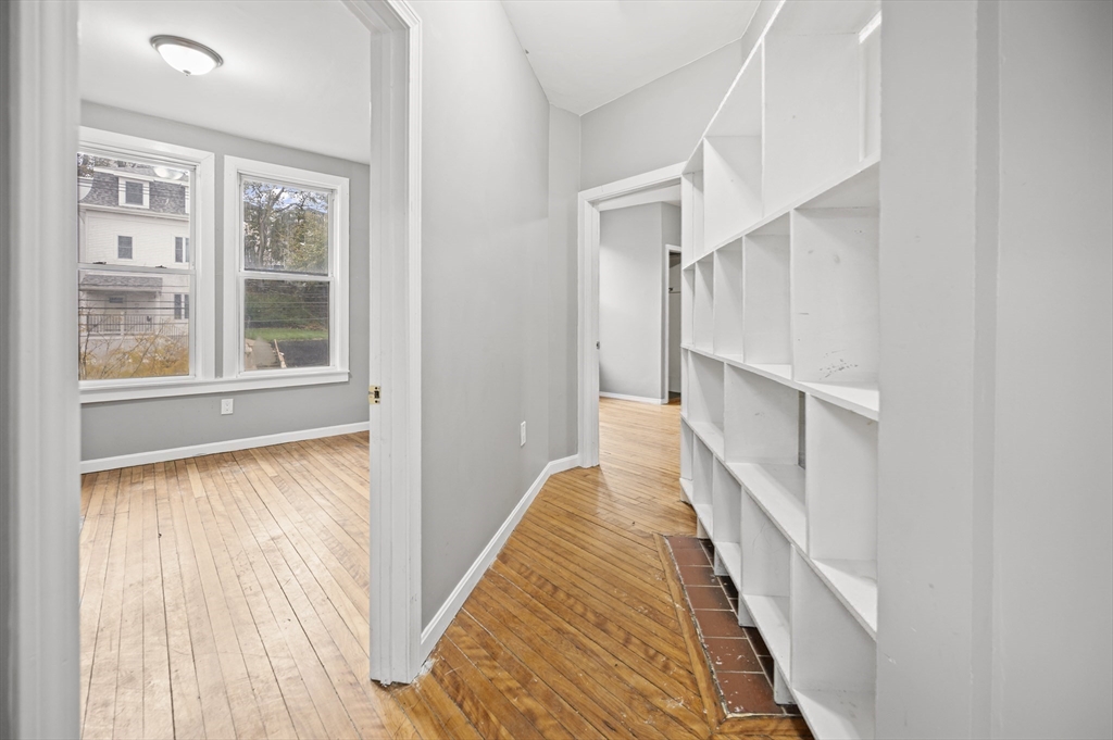 276 Washington Avenue, Unit 2 Chelsea, MA 02150 - Photo 11 of 28 a view of a hallway with wooden floor and entryway