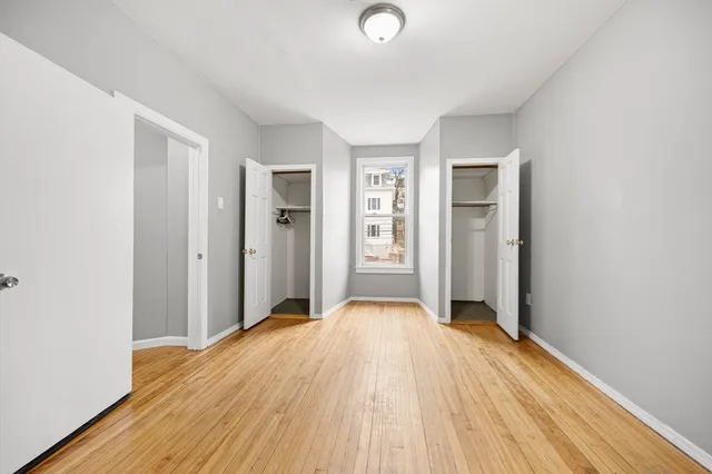 a view of a livingroom with wooden floor