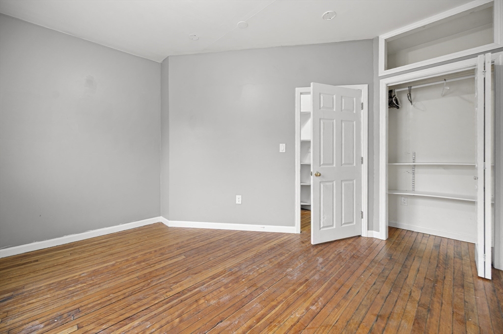 276 Washington Avenue, Unit 2 Chelsea, MA 02150 - Photo 18 of 28 a view of wooden floor in an empty room
