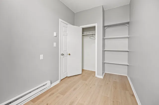 a view of an empty walk in closet