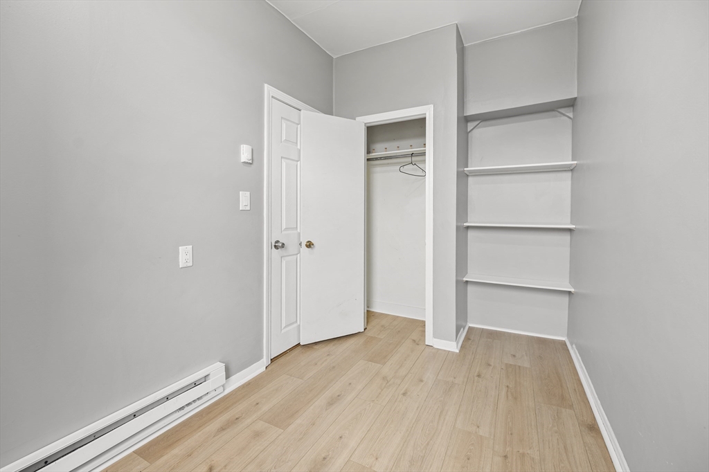 276 Washington Avenue, Unit 2 Chelsea, MA 02150 - Photo 21 of 28 a view of an empty walk in closet