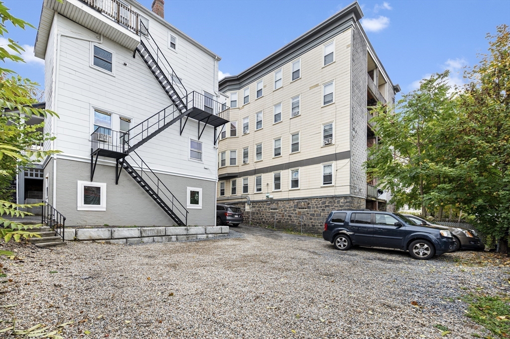 276 Washington Avenue, Unit 2 Chelsea, MA 02150 - Photo 27 of 28 a car parked in front of white house