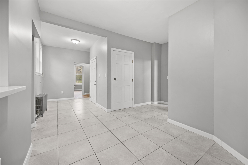 276 Washington Avenue, Unit 2 Chelsea, MA 02150 - Photo 4 of 28 a view of a hallway with closet area