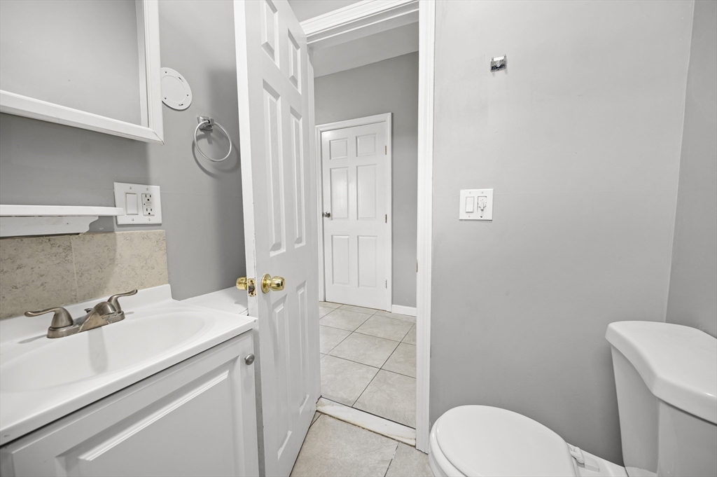276 Washington Avenue, Unit 2 Chelsea, MA 02150 - Photo 10 of 28 a bathroom with a sink toilet and shower