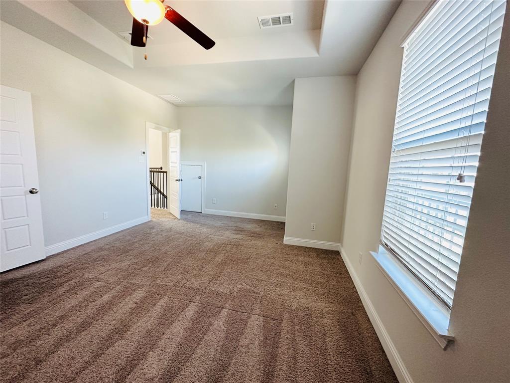 806 Davids Way Allen, TX 75013 - Photo 19 of 24 wooden floor in an empty room with a window