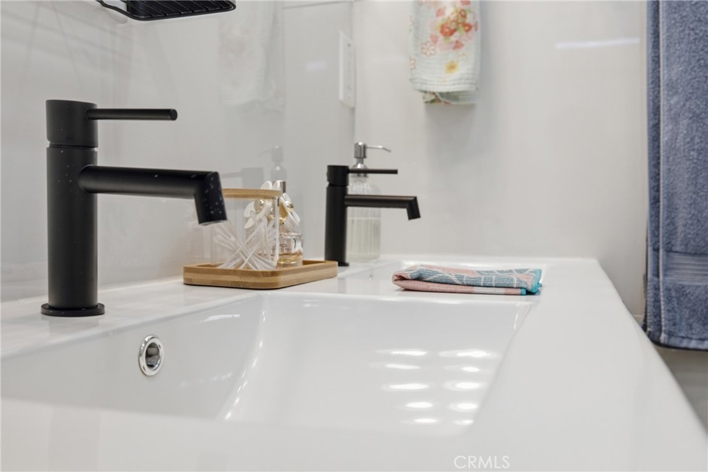 384 Colorado Street Arcadia, CA 91007 - Photo 41 of 51 a bathroom with a sink and a mirror