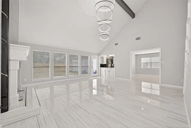 a view of a door with white cabinets