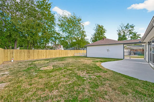 a view of deck with wooden fence and wooden fence