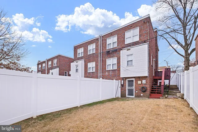 a view of a house with a roof deck