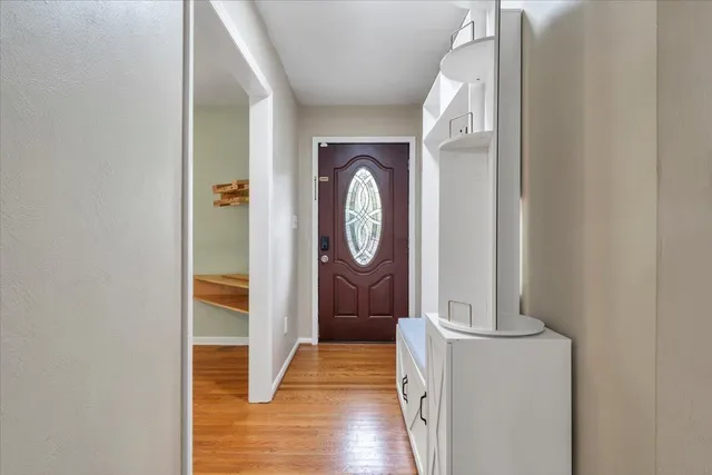 a view of entryway with wooden floor
