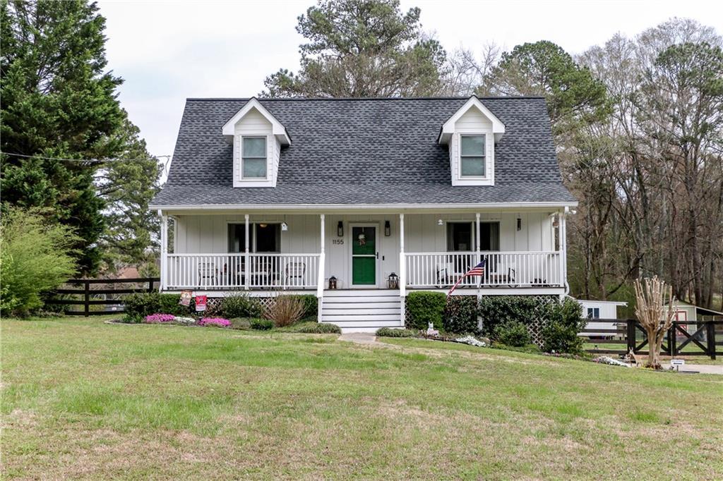 a front view of house with yard