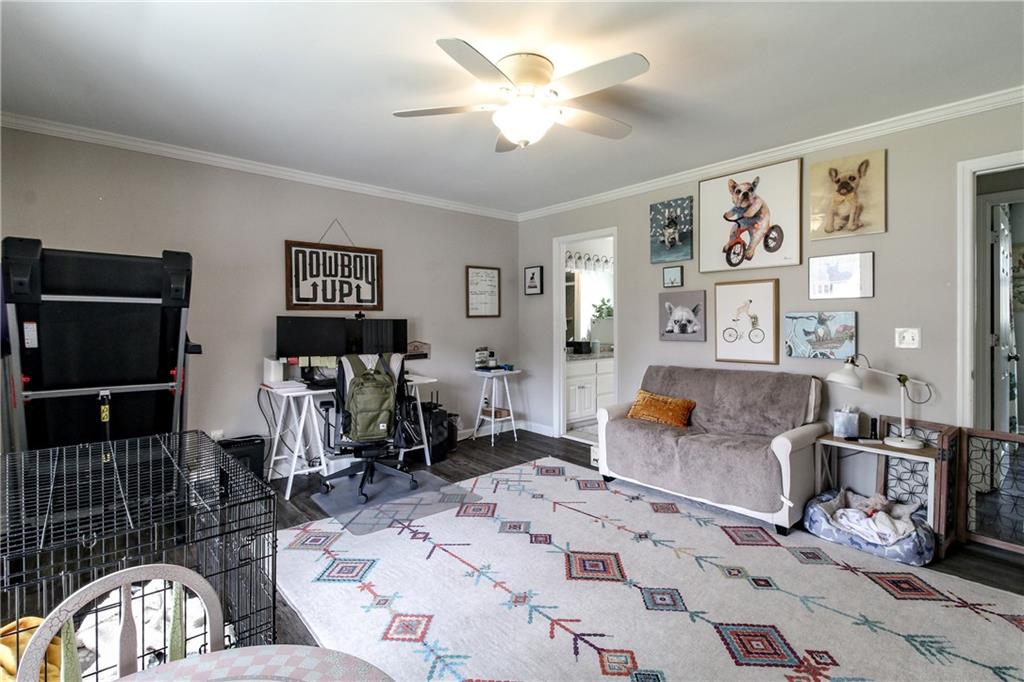 1155 Orchid Way Canton, GA 30115 - Photo 12 of 40 a living room with furniture a rug and white walls