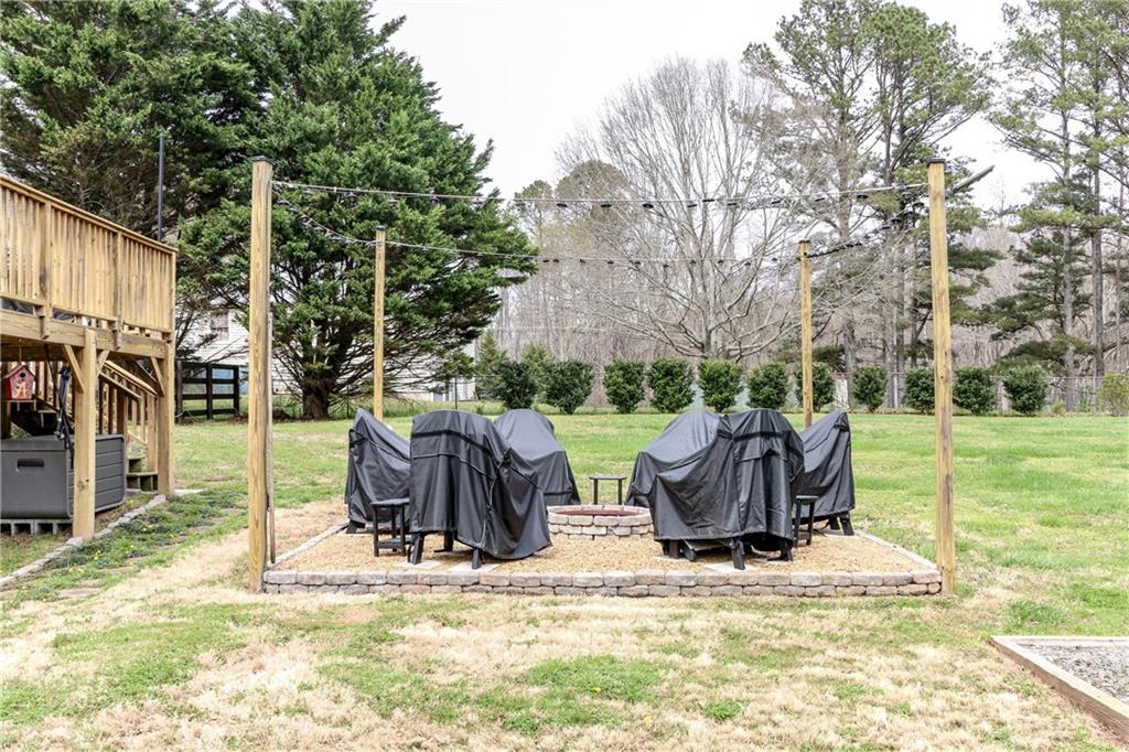 1155 Orchid Way Canton, GA 30115 - Photo 32 of 40 a view of outdoor space with playground and green space