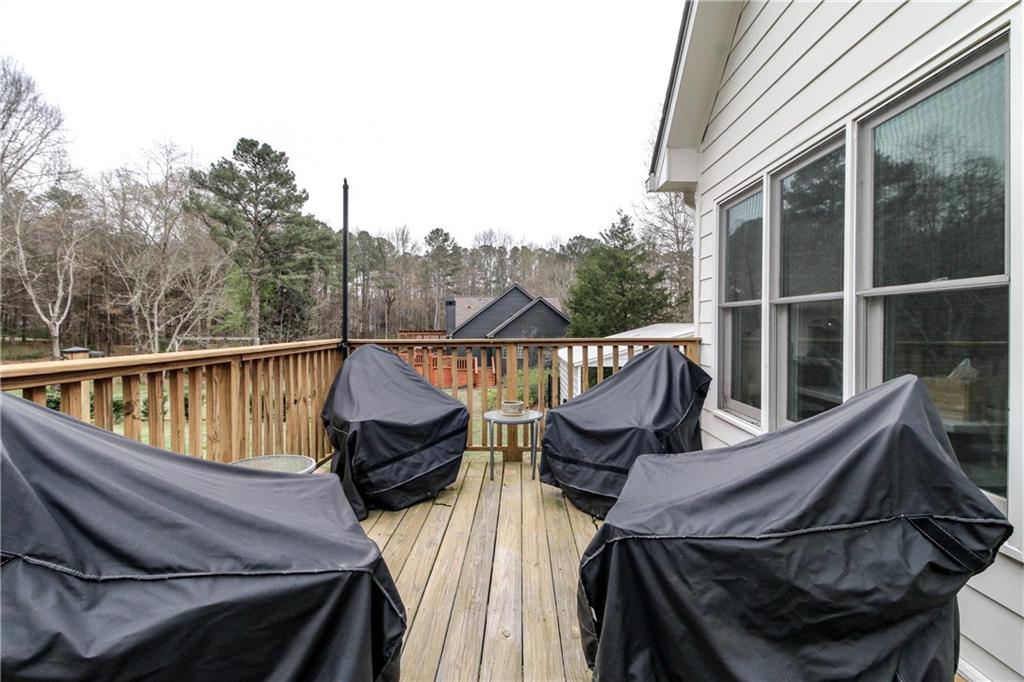 1155 Orchid Way Canton, GA 30115 - Photo 37 of 40 a view of a roof deck with couches