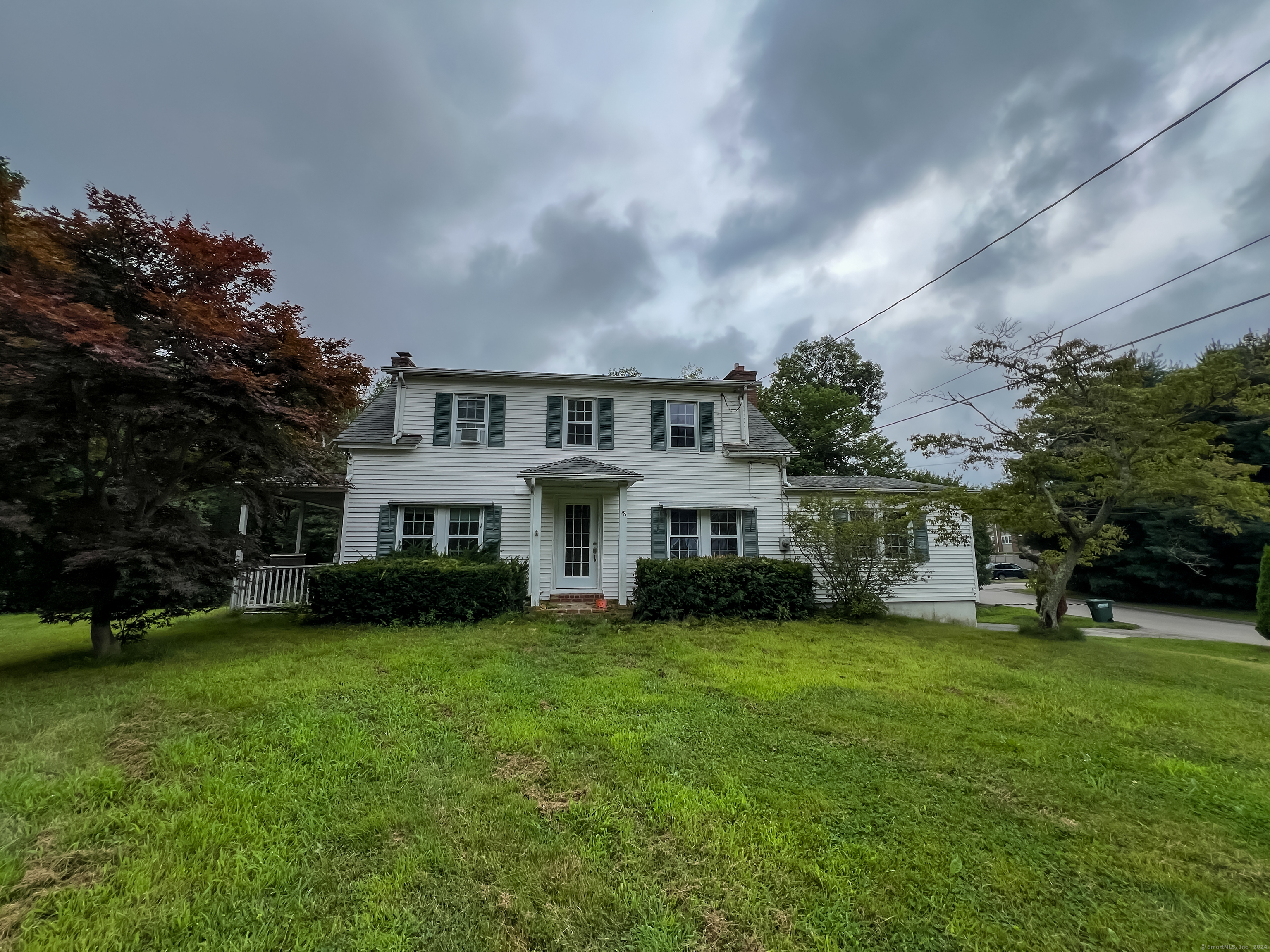 78 Jerome Road Montville, CT 06382 - Photo 1 of 1 a view of a house with a big yard and large trees