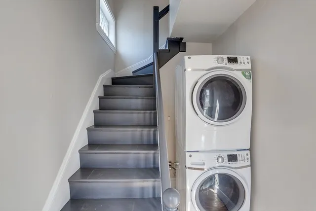 a view of entryway with washer and dryer