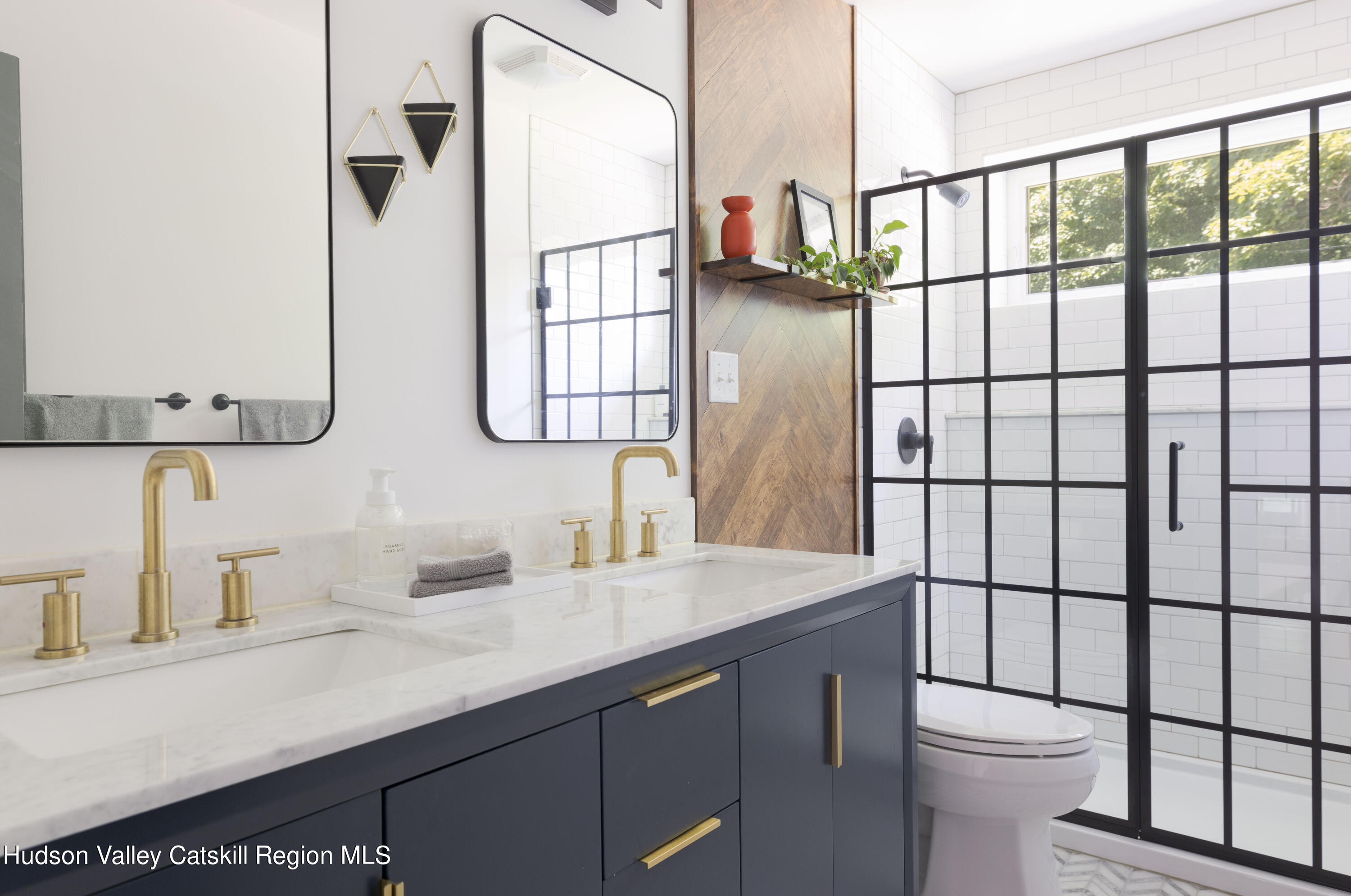 501 Huckleberry Turnpike Wallkill, NY 12589 - Photo 17 of 36 a bathroom with a sink a toilet and shower