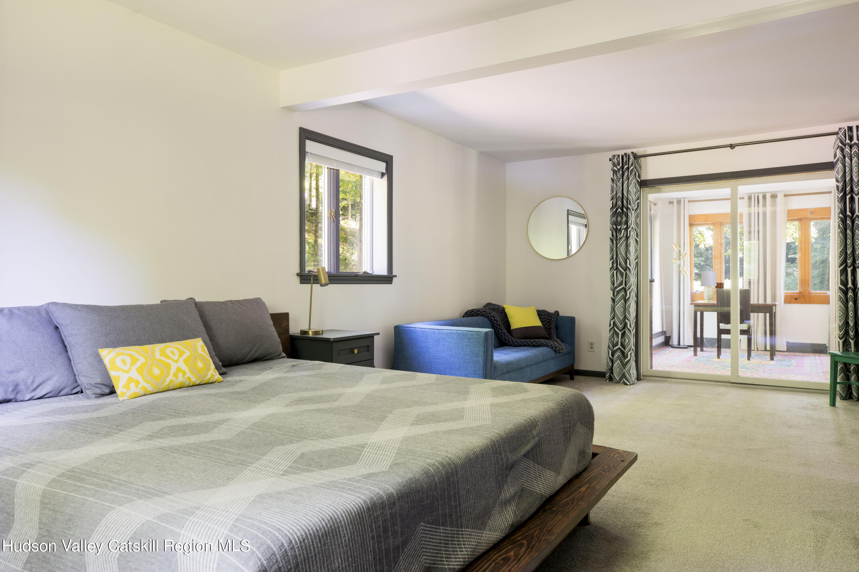 501 Huckleberry Turnpike Wallkill, NY 12589 - Photo 18 of 36 a bedroom with a bed and a lamp with window