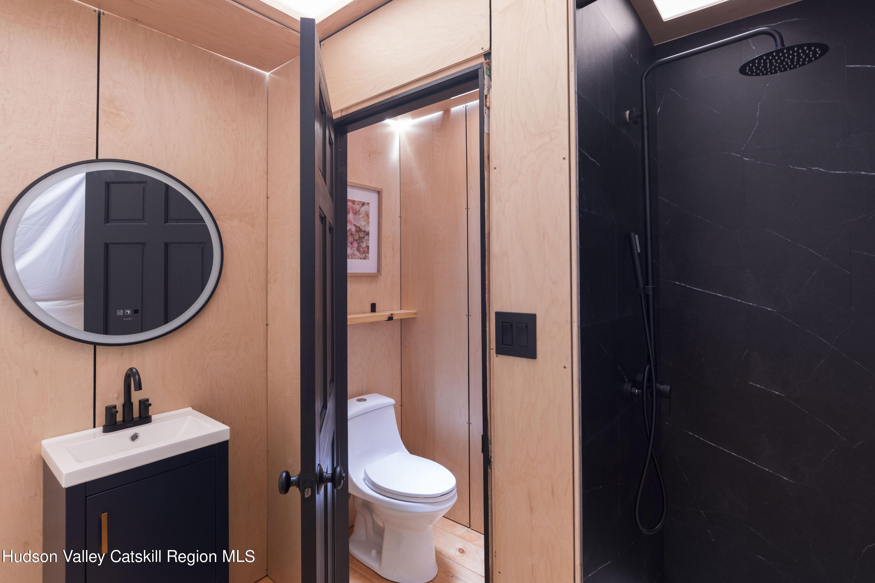 501 Huckleberry Turnpike Wallkill, NY 12589 - Photo 28 of 36 a bathroom with a sink a toilet and a mirror