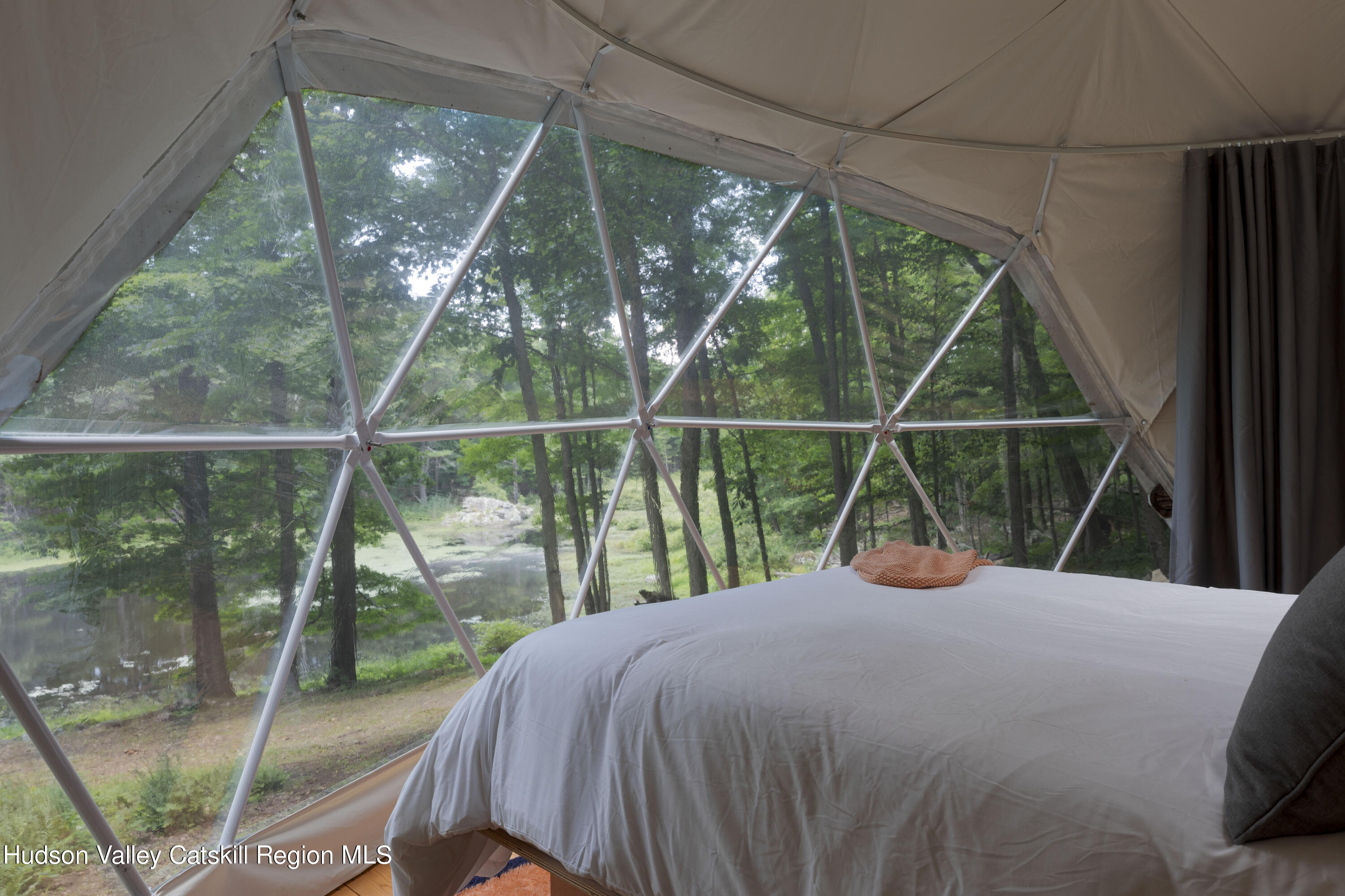 501 Huckleberry Turnpike Wallkill, NY 12589 - Photo 29 of 36 a bedroom with a bed and a large window