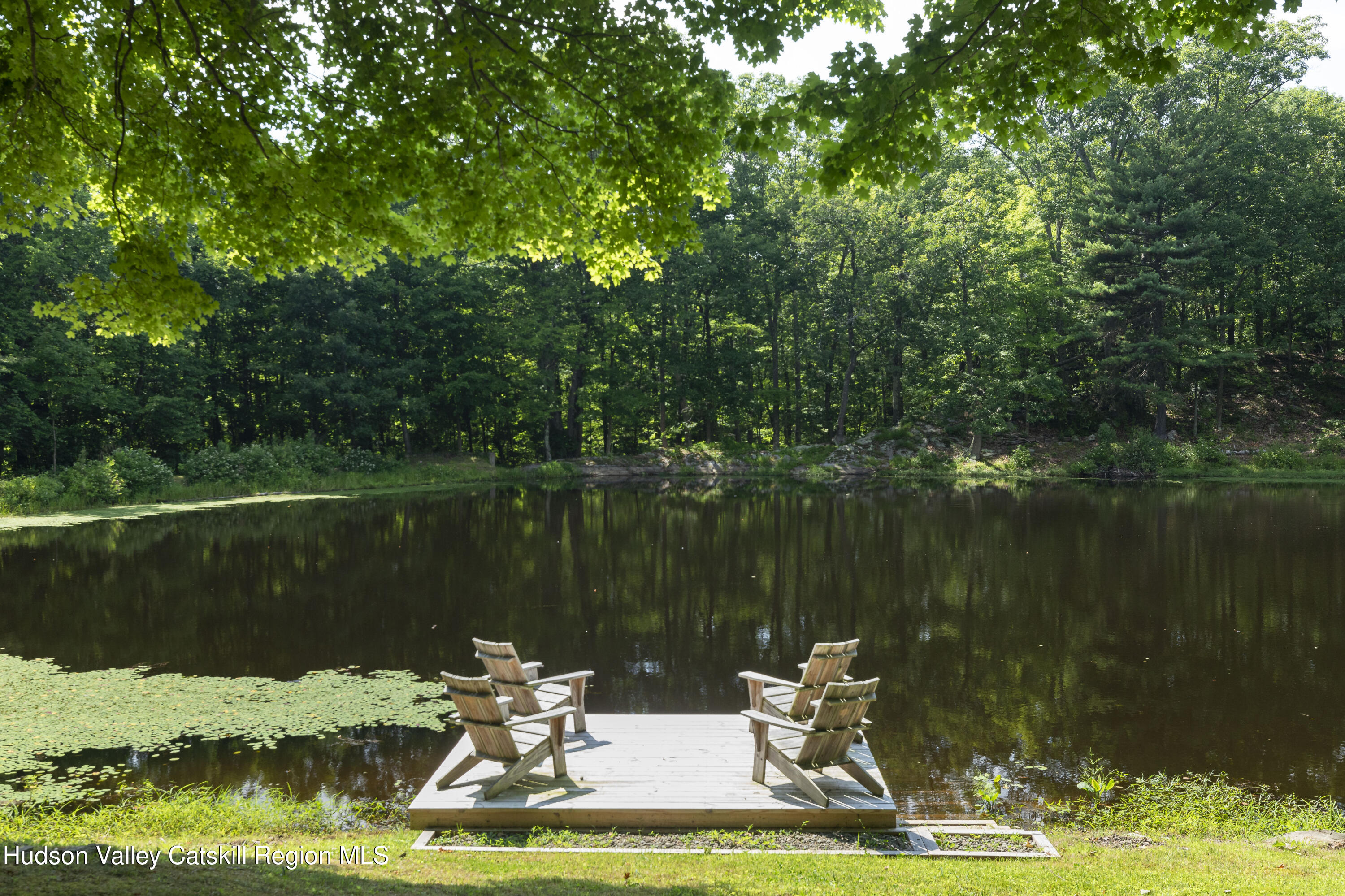 501 Huckleberry Turnpike Wallkill, NY 12589 - Photo 4 of 36 a body of water with a tree in the background