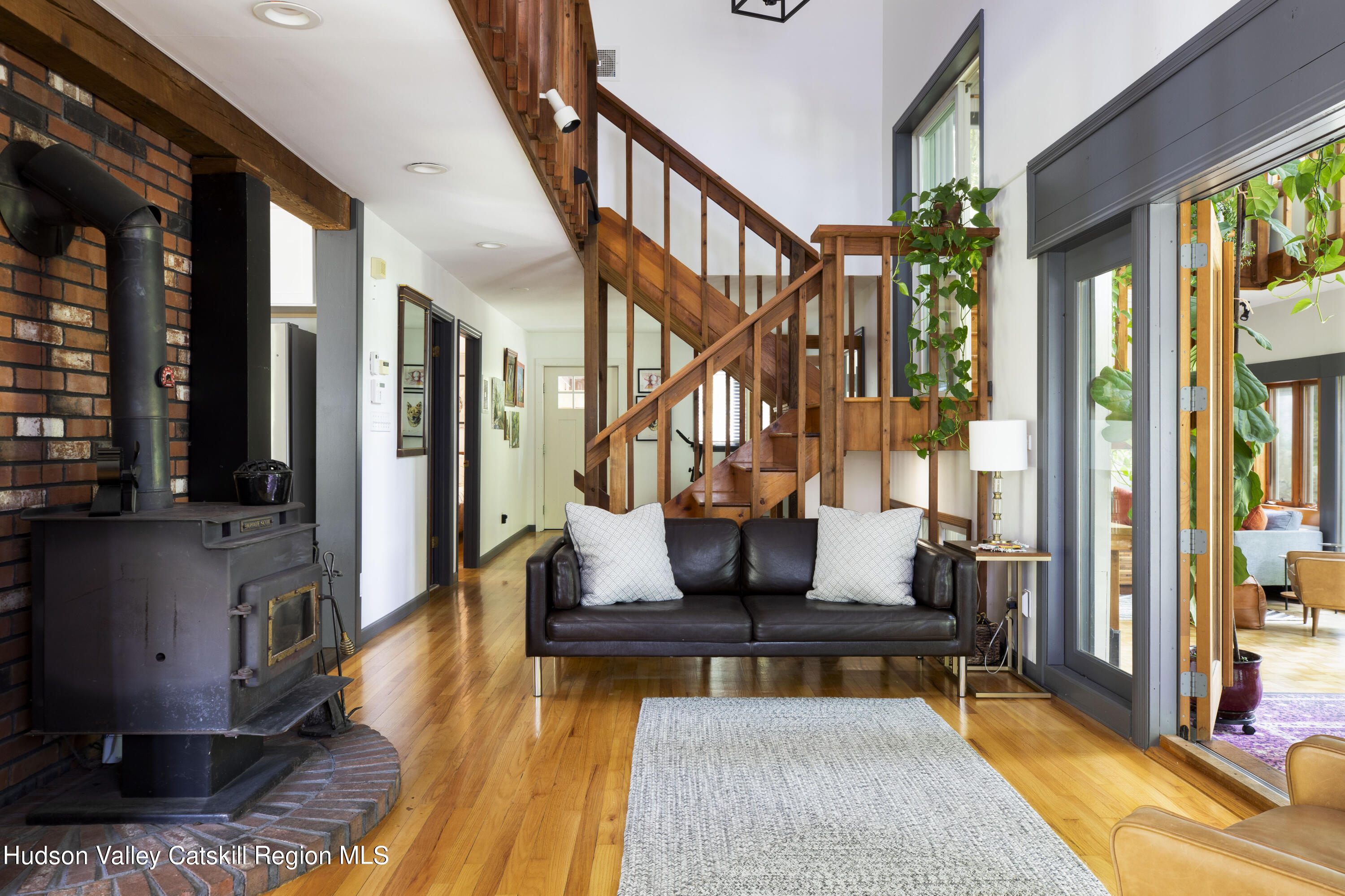 501 Huckleberry Turnpike Wallkill, NY 12589 - Photo 5 of 36 a living room with furniture stove and a table