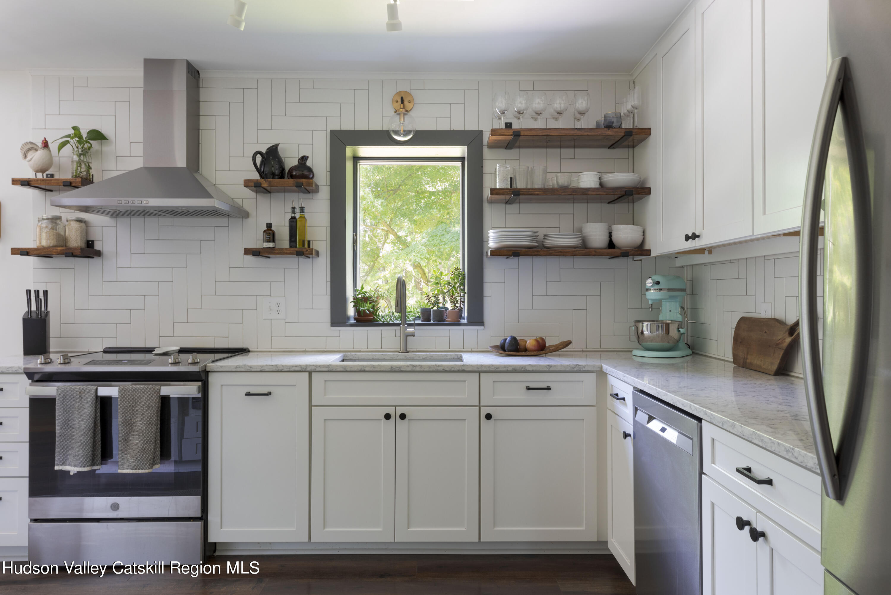 501 Huckleberry Turnpike Wallkill, NY 12589 - Photo 7 of 36 a kitchen with stainless steel appliances white cabinets and a sink