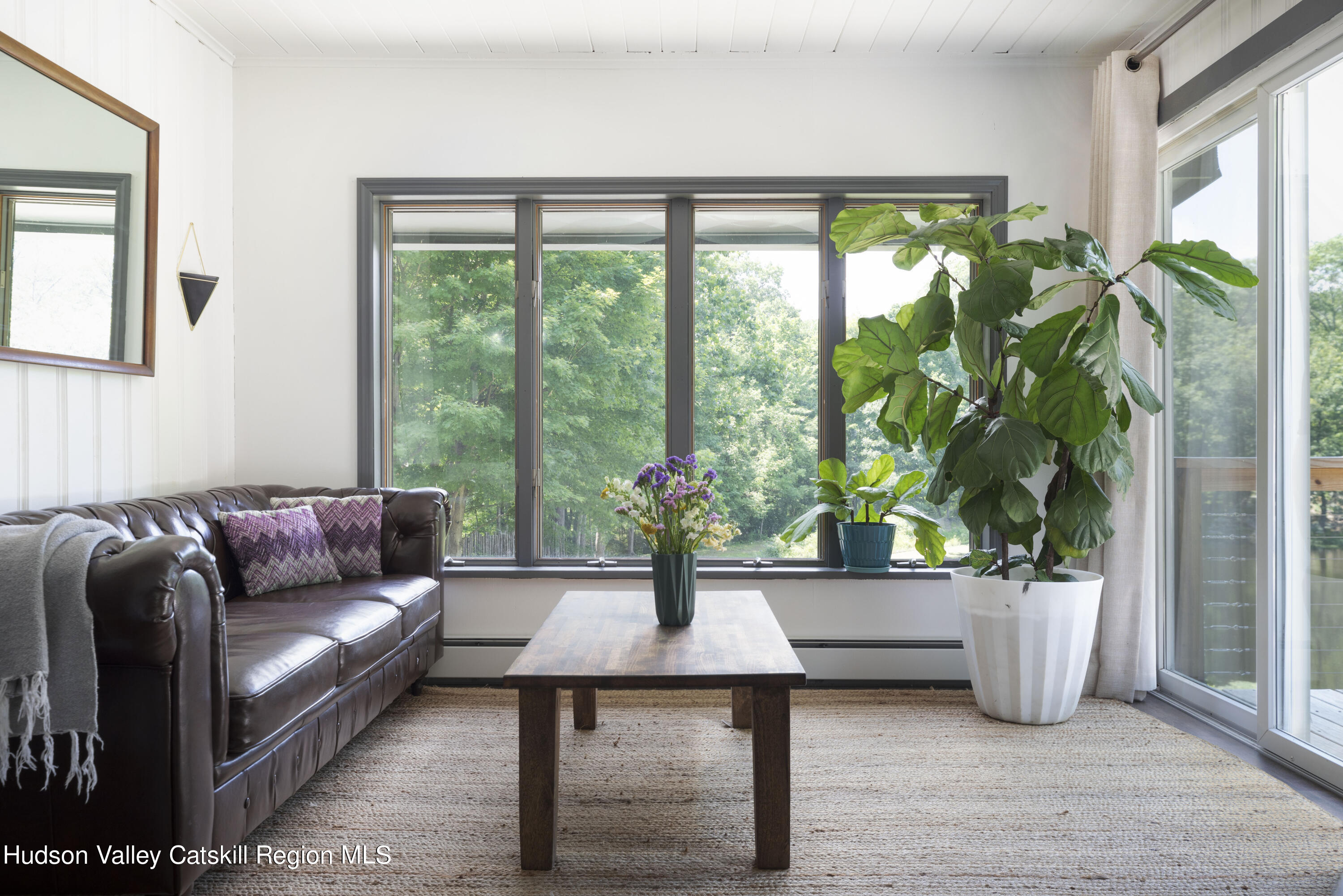 501 Huckleberry Turnpike Wallkill, NY 12589 - Photo 9 of 36 a living room with furniture and a potted plant