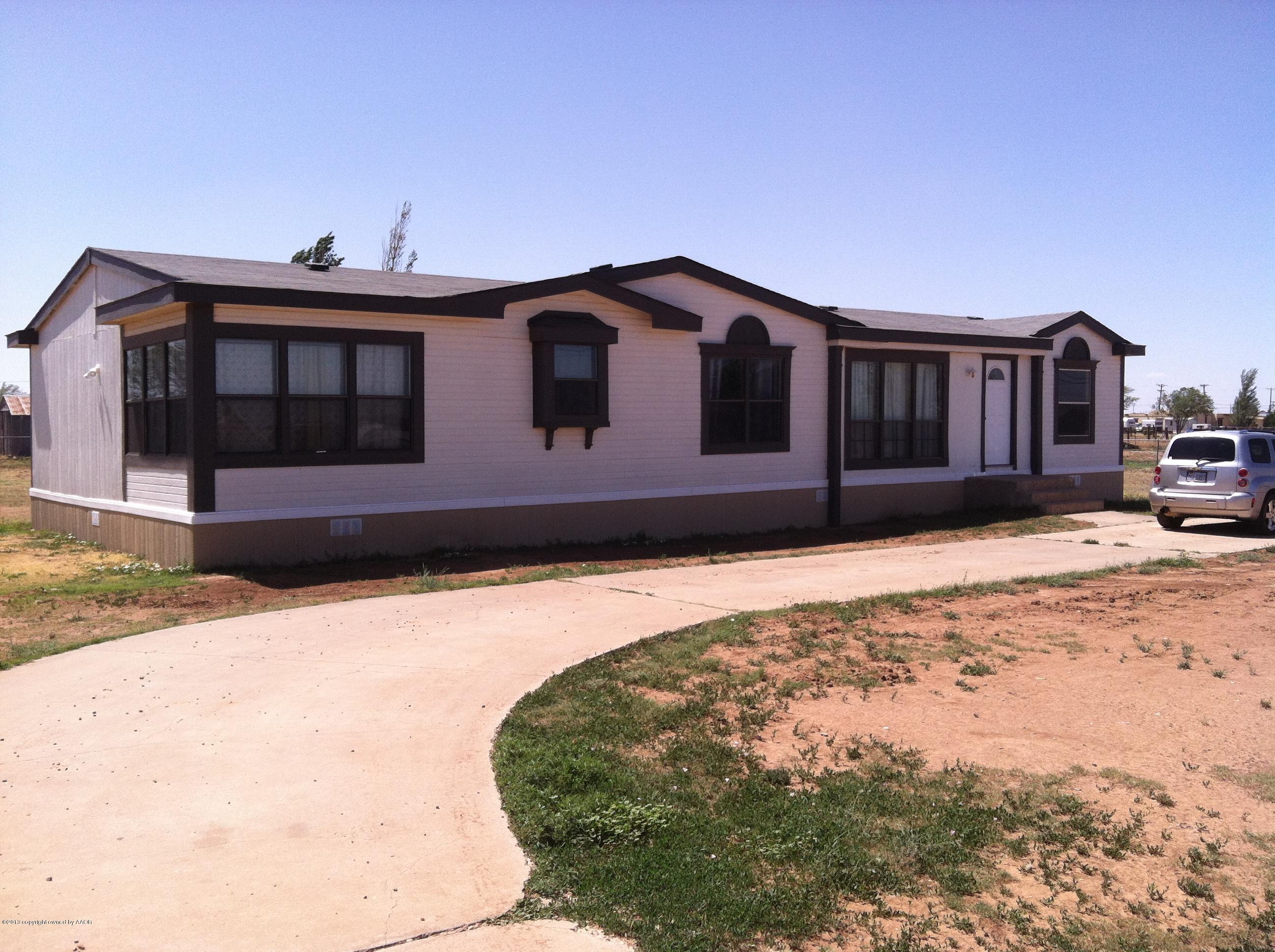 14176 Savannah Road Amarillo, TX 79118 - Photo 1 of 17 a front view of a house with a yard