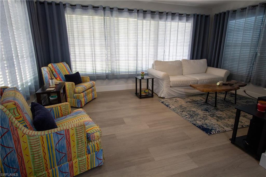 1280 Morningside Drive Naples, FL 34103 - Photo 13 of 35 a living room with furniture and a window