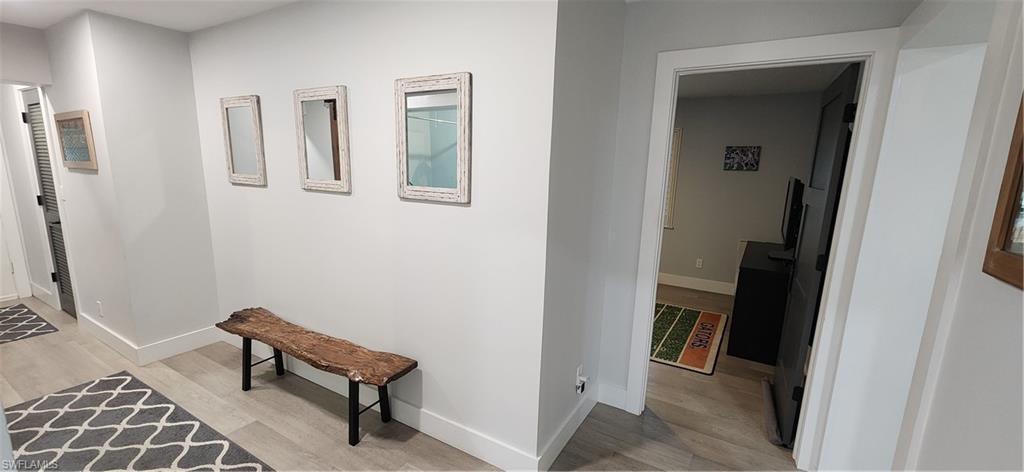 1280 Morningside Drive Naples, FL 34103 - Photo 19 of 35 a view of a room with gym equipment