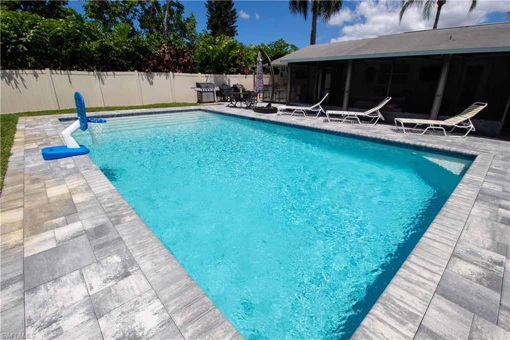 1280 Morningside Drive Naples, FL 34103 - Photo 27 of 35 a view of outdoor space with swimming pool