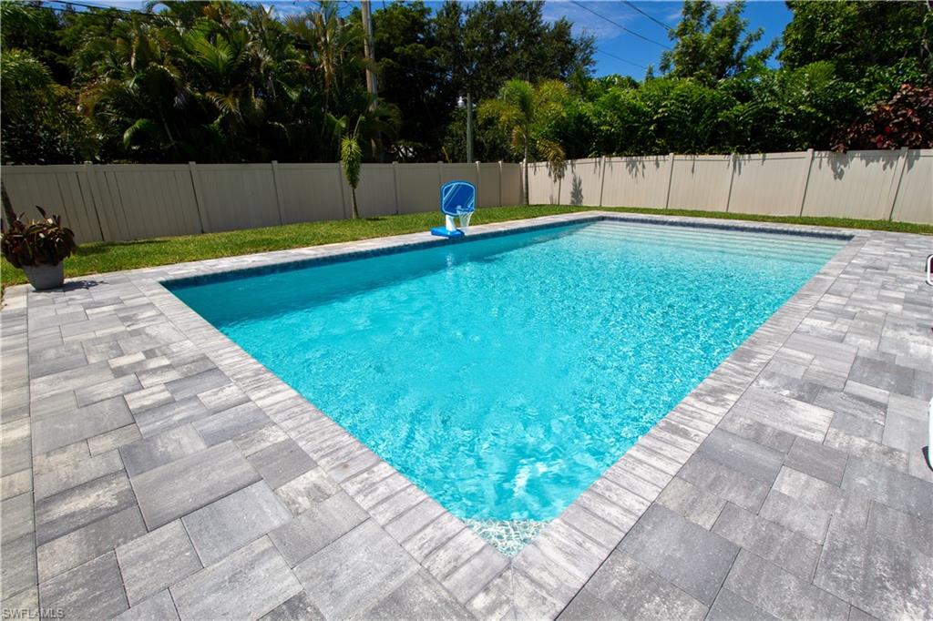 1280 Morningside Drive Naples, FL 34103 - Photo 29 of 35 a view of a backyard with small trees