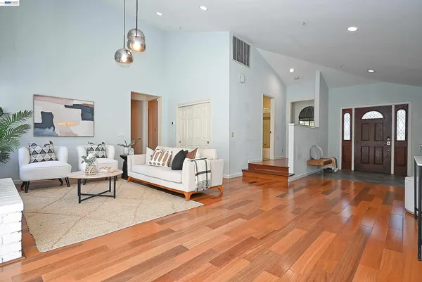 a kitchen with a stove top oven sink and cabinets