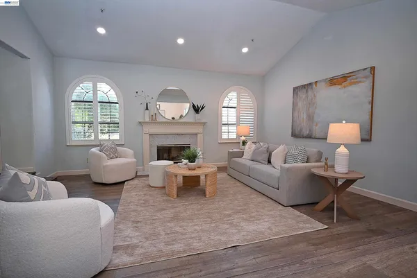 a dining room with furniture and window