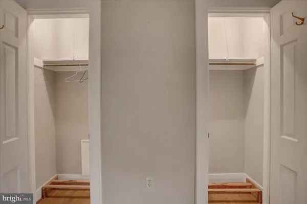 a bathroom with a mirror and a shower curtain