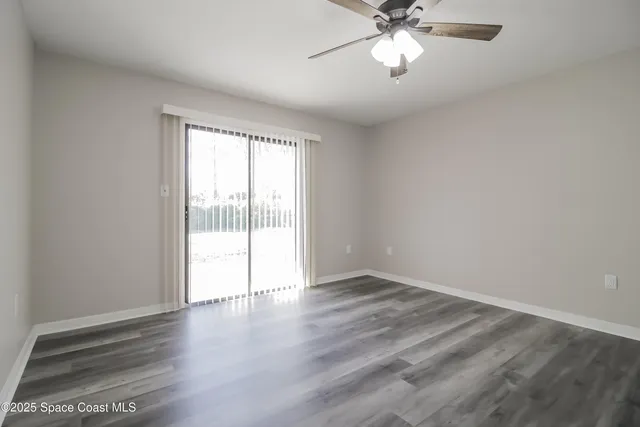 a kitchen with a sink cabinets and window