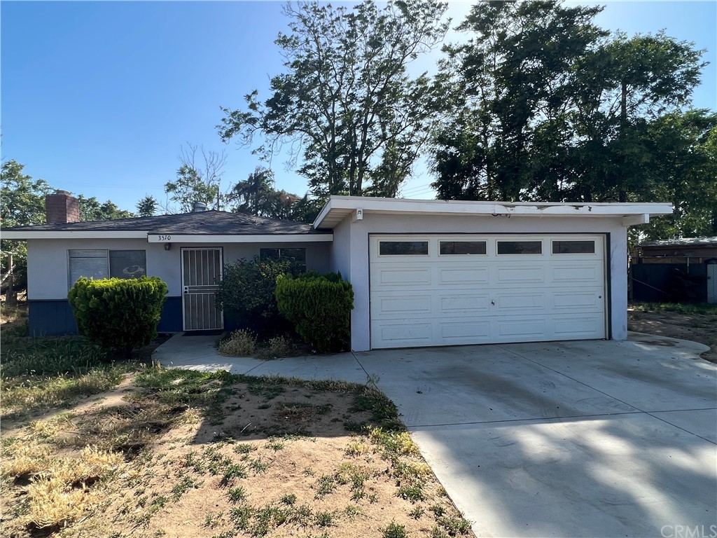 3510 Burl Drive Riverside, CA 92501 - Photo 1 of 1 a view of a house with backyard and sitting area