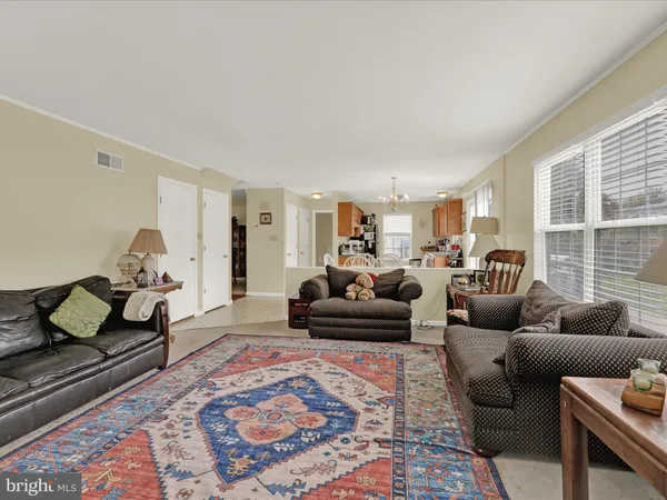 a living room with furniture and a couch