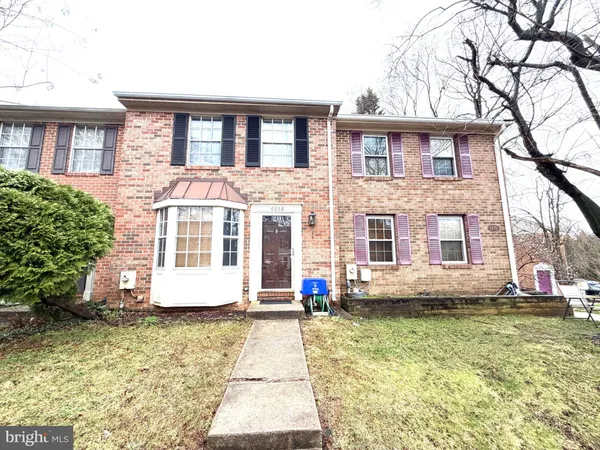 a front view of a house with swimming pool